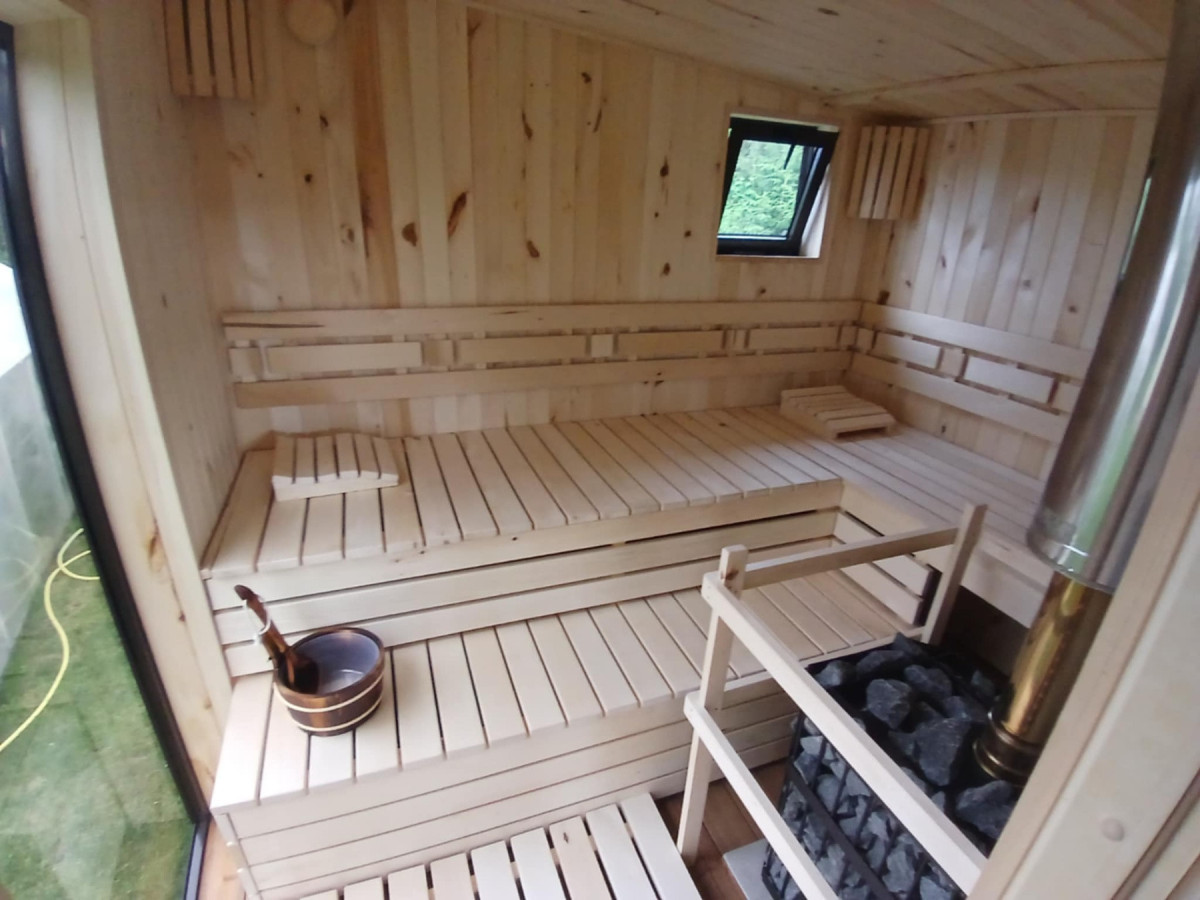 Woody, MB „Mūsų Hytte“