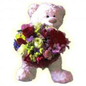 Meškinas su gėlėmis